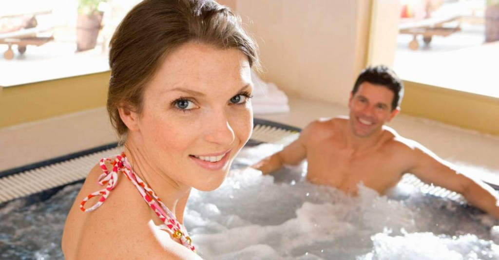 denver hot tub with woman and man relaxing