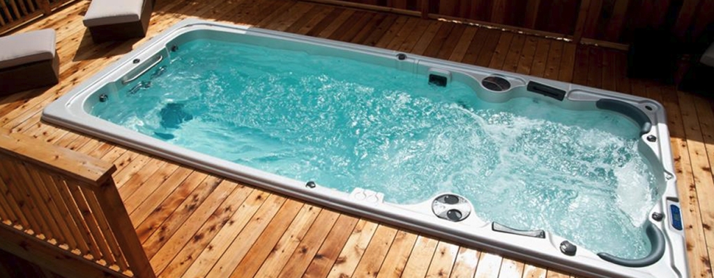 swim spa with wood deck surrounding